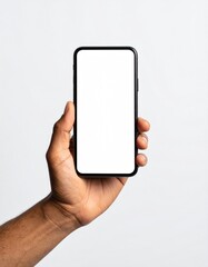 Hand holding smartphone with blank screen