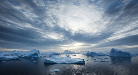 Dramatic sky over a sea filled with icebergs, showcasing the stark beauty of the polar regions and the power of nature