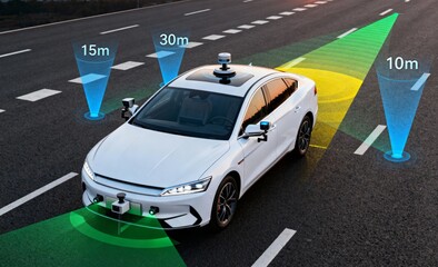 Self-driving test car using lidar and camera sensors on highway at sunset, autonomous vehicle scanning lanes with distance overlays for safety research, navigation and advanced driver assistance