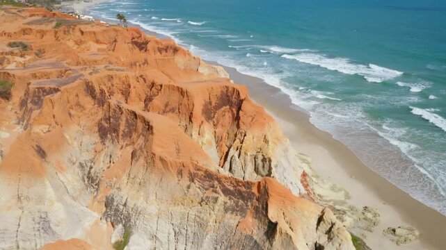 Aerial view of the colorful cliffs and beach at canoa quebrada, brazil