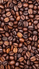 Obraz premium Close-up view of many coffee beans