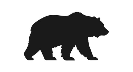 A striking dark bear form captured in a dramatic silhouette