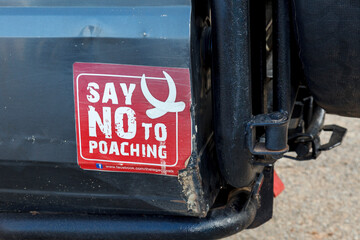 Say no to poaching sign on a jeep in Africa