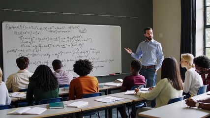 Educator actively engages diverse classroom, illustrating mathematical concepts on whiteboard, creating an interactive learning atmosphere with focused students - Powered by Adobe