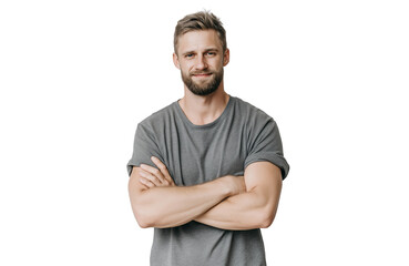 A confident bearded man with short brown hair, wearing a grey tshirt, stands with his arms crossed and looks directly at the camera, isolated on transparent background