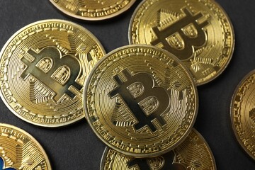 Close up of bitcoin and cryptocurrency investment concept. Electronic decentralized money concept