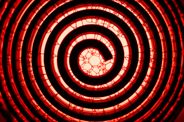 Naklejka premium Metal Spiral and Bubble Reflecting Red