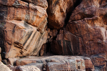 Ancient natural sandstone cave entrance.