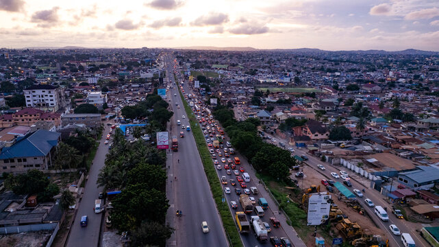 Aerial view of Accra Ghana N1 highway traffic at dusk.