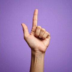 Hand pointing upward on purple background