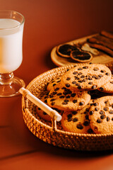 Warm cookies and milk served on a cozy table for a delightful treat