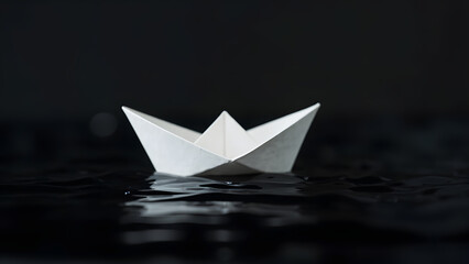 Minimalist paper boat on dark water symbolizing migration, escape and global refugee crises.