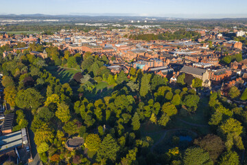Aerial view of Chester with Grosvenor Park’s green landscape beside the historic city centre.
