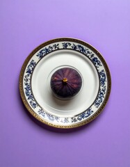 Fig on ornate plate