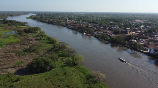 Aerial view of the magdalena river near historic city of Santa Cruz de Mompox in sunlight in Colombia, a World Heritage Site