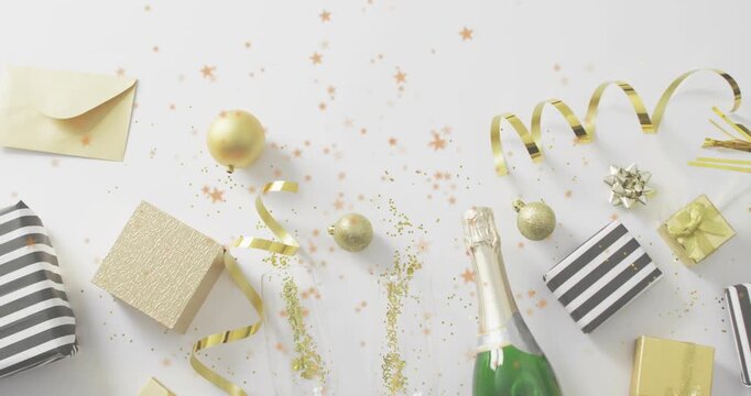 Champagne cork popping confetti bursting between flutes, glitter drifting decorating gifts