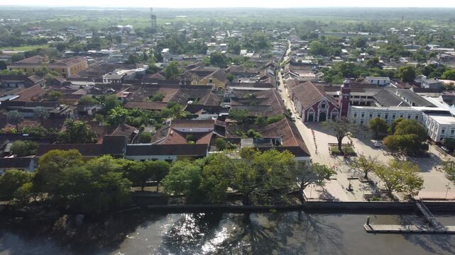 Aerial view of the historic city of Santa Cruz de Mompox in sunlight with the river and the Iglesia de Santa B&aacute;rbara (Church of San B&aacute;rbara) Colombia, a World Heritage Site