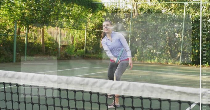 Female tennis player responding to serve in sports training, pivoting striking ball backhand volley