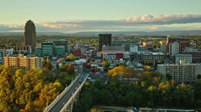 Aerial view of the city of allentown pennsylvania at sunset with a bridge