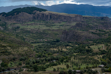 Obraz premium Panoramic Canyon View in Mountainous Region with Overcast Sky