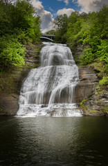 Majestic Waterfall Cascading Into Serene Pool Below