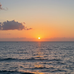 Fototapeta premium The sea at sunset from Italy, with some clouds on sky.
