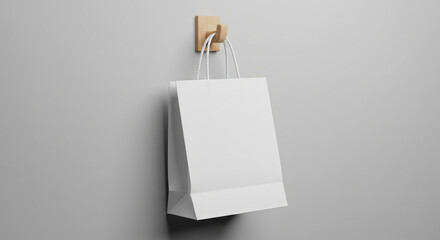 Stylish shopping bag mockup hanging on hook with neutral background, ideal for branding, packaging design, retail identity, advertising display, and creative product presentation