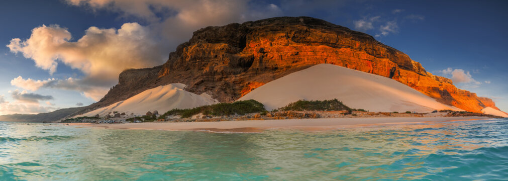 Panorama of Huge Sand Dunes Meeting the Sea at Socotra Island Sunset