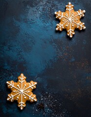 Festive gingerbread cookies on a dark blue textured surface
