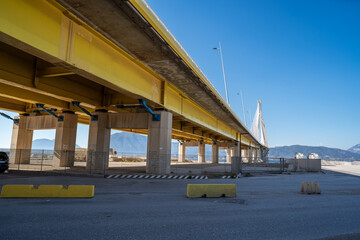 View from below of the Rio Antirio Bridge showing the shock absorbers that protect the bridge from falling during an earthquake.