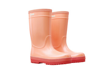 Pink rubber rain boots with textured soles for outdoor use, cut out
