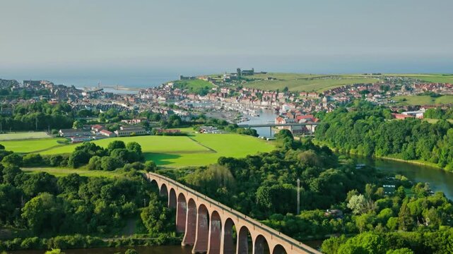 Whitby cityscape with the river esk flowing into the north sea