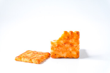 Square biscuits coconut over a white background.