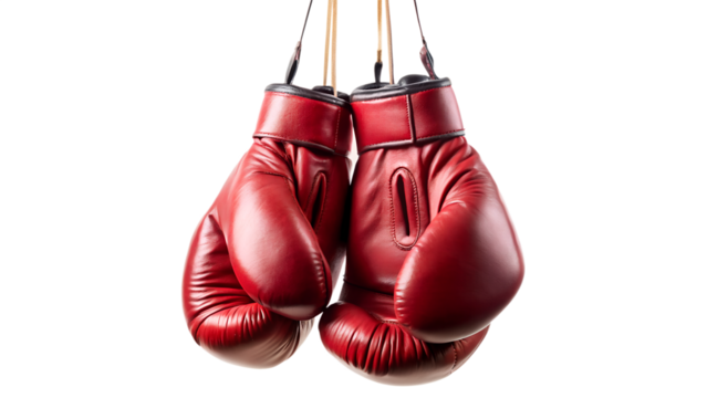 Pair of red boxing gloves hanging isolated on transparent background, showcasing the essence of combat sports and the pursuit of victory