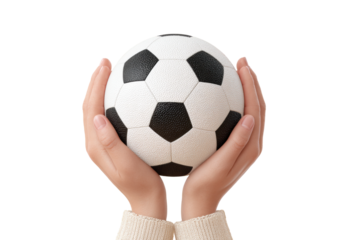 Hands holding soccer ball on black background, cut out