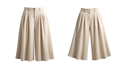 Stylish beige pleated culottes or wide-leg cropped pants isolated on a white background.
