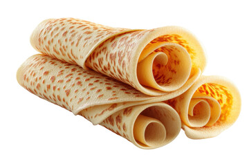 Close-up of rolled pancakes with golden spots, cut out