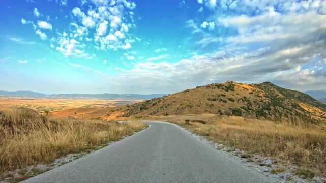Breathtaking nature, descending the local narrow road, POV driver perspective