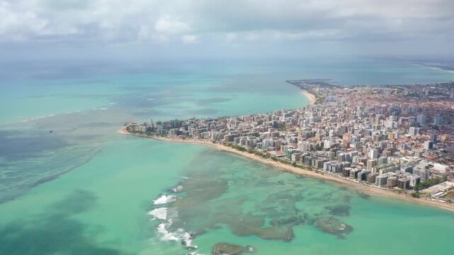 Aerial view of maceio, brazil, showcasing its urban landscape and turquoise sea