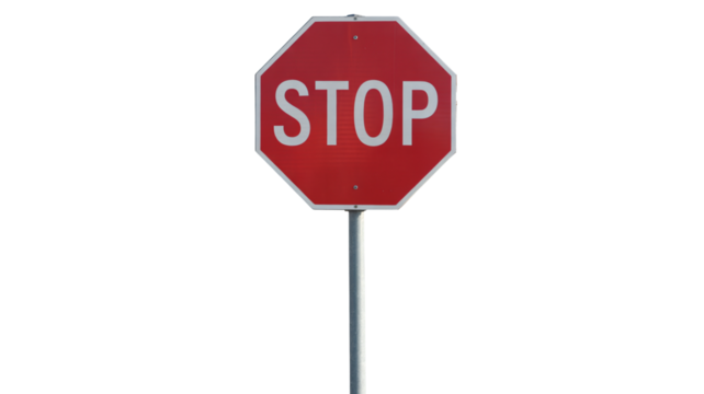 Road safety stop sign alerts drivers and pedestrians to halt for traffic control