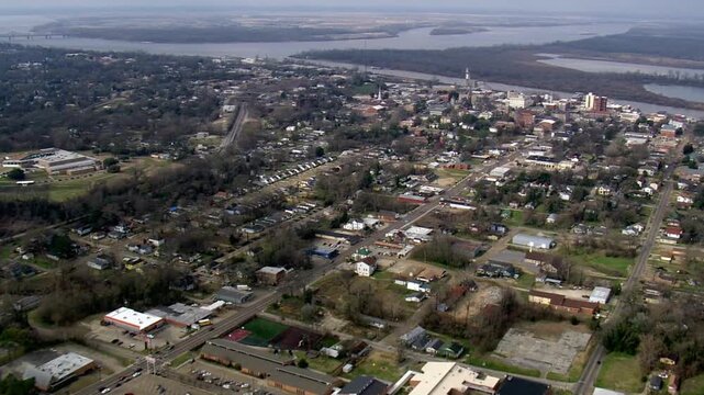 Aerial view captures the cityscape of natchez, mississippi, along the river