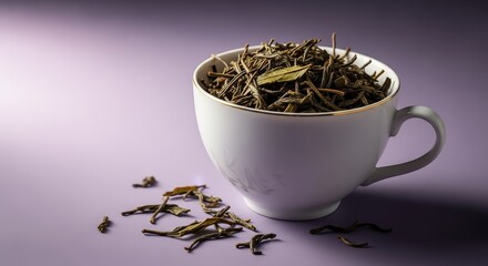 Fototapeta premium Herbal Tea in a Porcelain Cup with Gold Rim