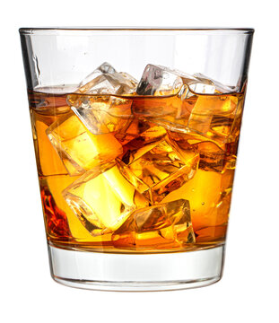 Whiskey glass with ice cubes on rocks