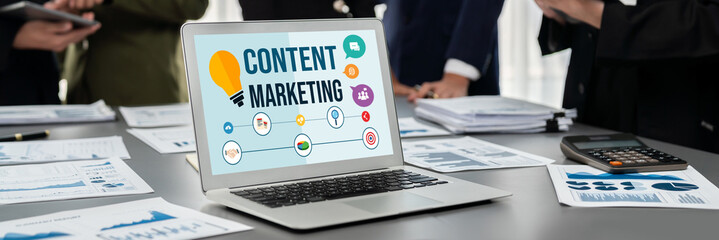 Panorama shot analyst team utilizing BI Fintech to analyze financial report with laptop. Businesspeople analyzing BI data dashboard displayed on laptop screen for business insight. Prodigy