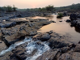 river in the mountains of the Western Ghats, mountain river, waterfall in the mountains.