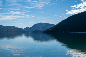 Pure nature and ecology with forestes on the mountains around the blue lake