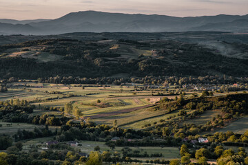 Fototapeta premium Magical summer sunset light in the mountains of Maramures, Romania