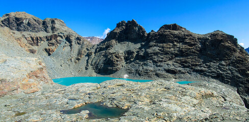 Panorama of Alps mountains on a sunny day. High resolution widescreen panorama of mountain...