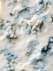 Beautiful close-up of soft blue and white swirled texture with intricate patterns resembling marbled stone or creamy dessert topping in natural light