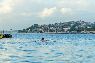 View of a coastal town on a hillside next to a fishing pier, Salvador Bahia